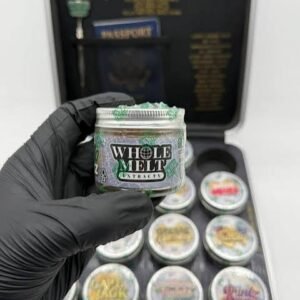 buy-wholemelt-sugar-passport-limited-edition-1lb-online Wholemelt Sugar Passport Limited Edition 1 lb bulk jar containing premium amber live resin sugar and terpene sauce extract